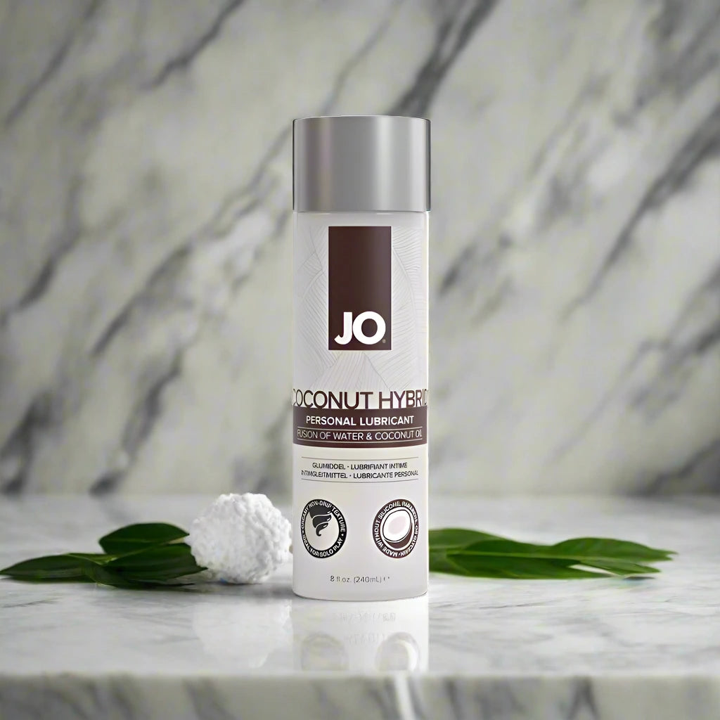 A bottle of JO Coconut Hybrid Original Lubricant with a white label and silver cap, prominently displaying the brand logo 'JO' at the top.